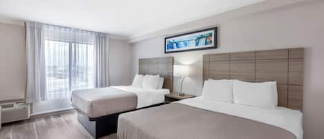 Room, 2 Queen Beds, Non Smoking | Premium bedding, desk, iron/ironing board, free cribs/infant beds