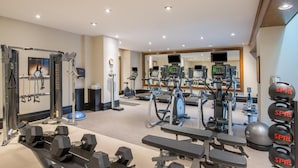 A modern gym with various exercise equipment, including dumbbells, treadmills, and weight machines. - Wyndham Gatineau-Ottawa & Conference Centre (Gatineau)
