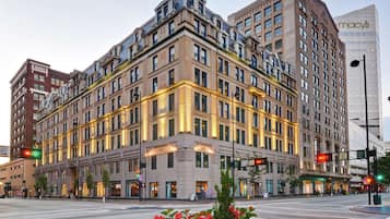 Stunning corner hotel with a classic, symmetrical facade and central entrance.