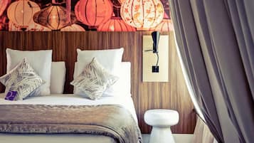 Premium bedding, memory-foam beds, minibar, in-room safe