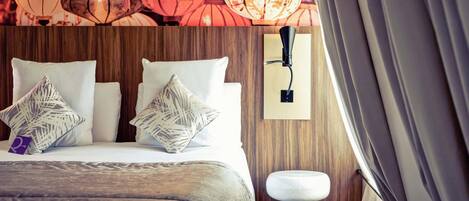 Premium bedding, memory-foam beds, minibar, in-room safe