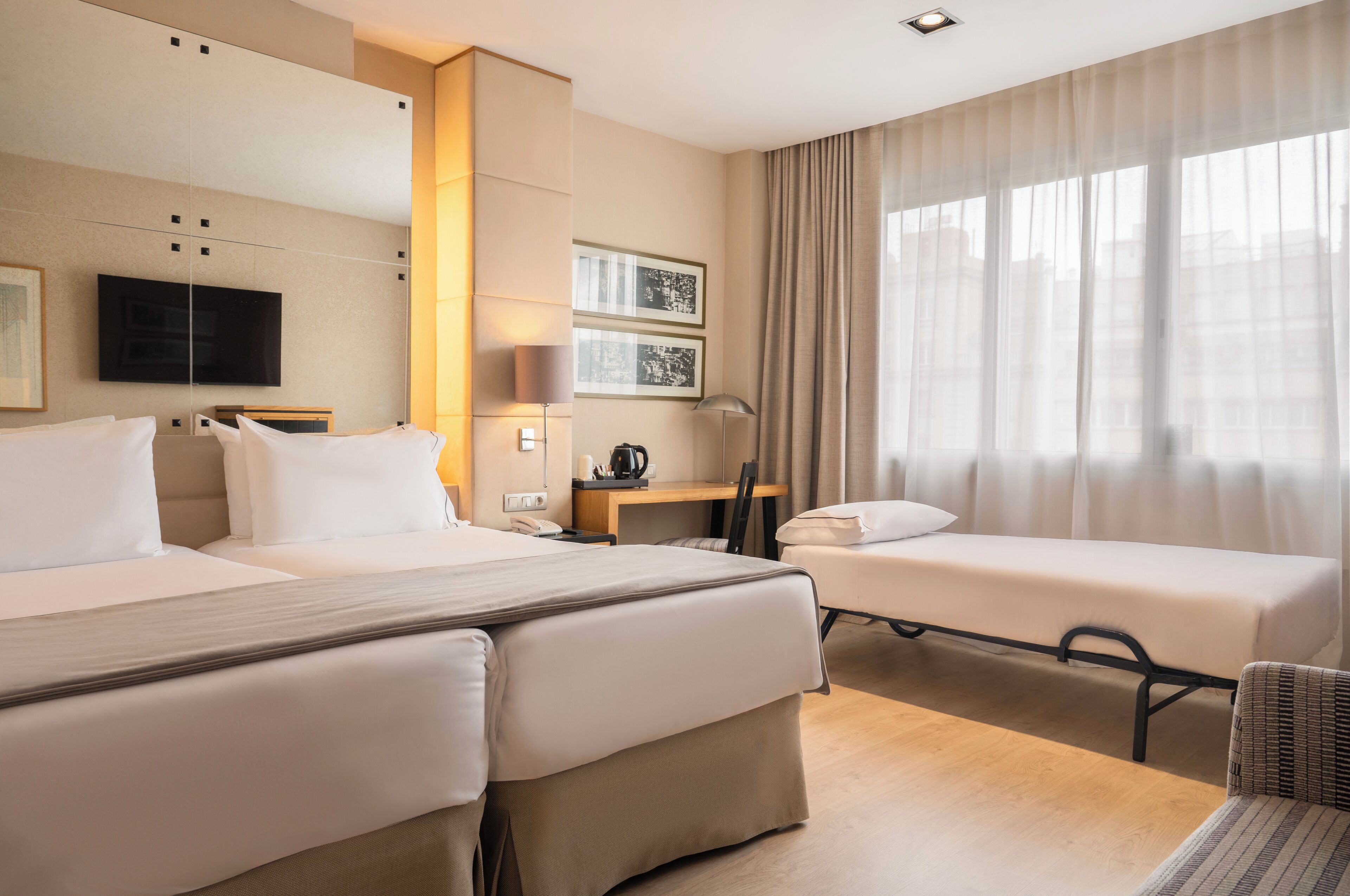 hypo-allergenic bedding, down duvets, in-room safe, desk