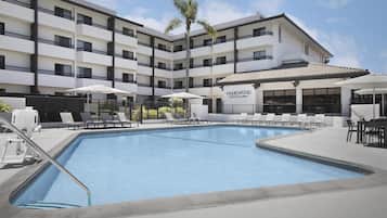 Outdoor pool, open 9:00 AM to 10:00 PM, pool umbrellas, pool loungers