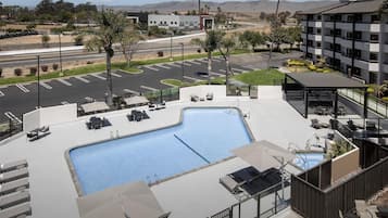 Outdoor pool, open 9:00 AM to 10:00 PM, pool umbrellas, sun loungers