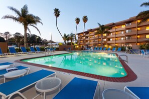 Outdoor pool, pool umbrellas, sun loungers