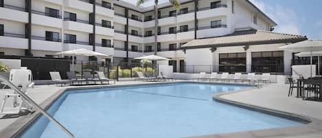 Outdoor pool, open 9:00 AM to 10:00 PM, pool umbrellas, sun loungers