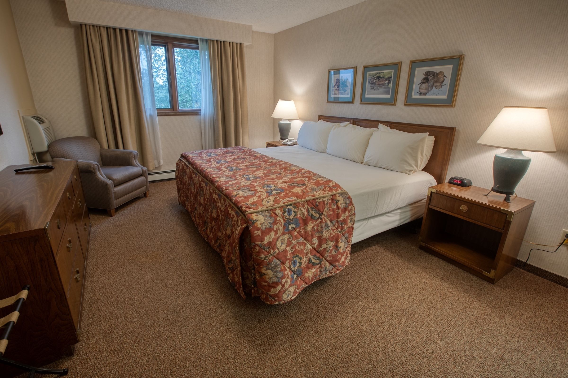 deluxe one bedroom king suite | 1 bedroom, in-room safe, desk, iron/ironing board