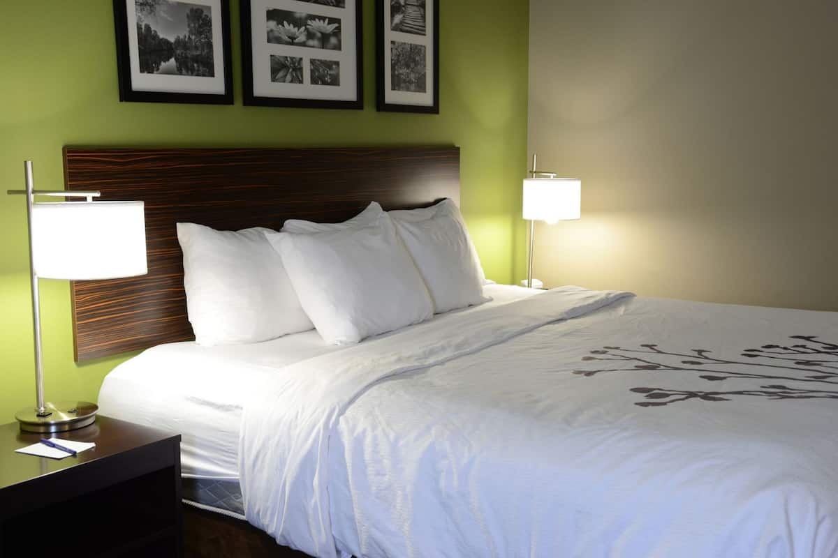Pillowtop beds, desk, blackout drapes, iron/ironing board