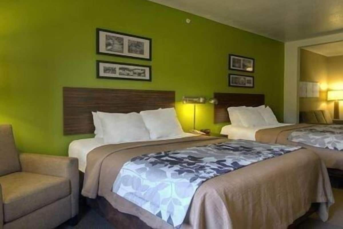 Pillowtop beds, desk, blackout drapes, iron/ironing board