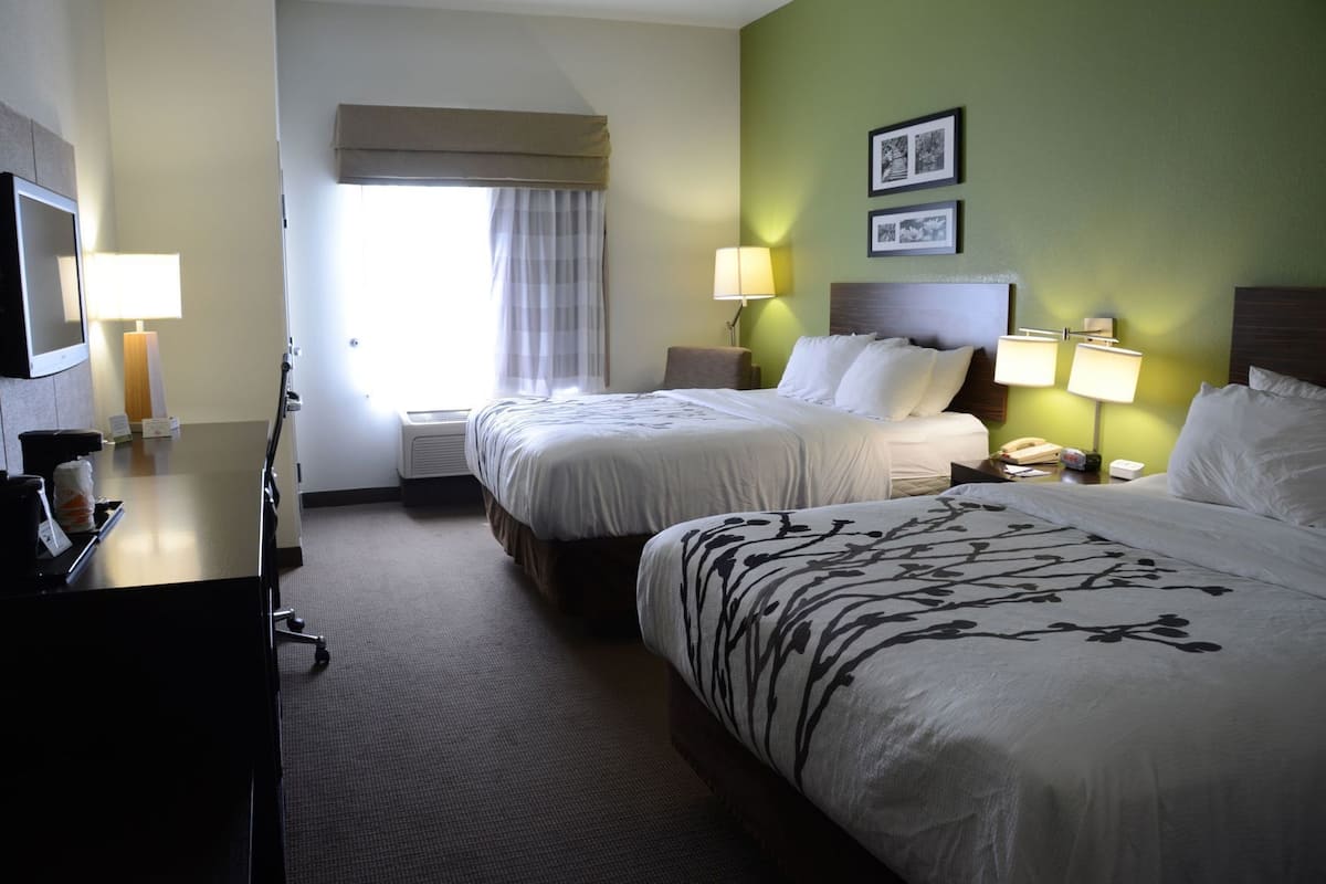 Pillowtop beds, desk, blackout drapes, iron/ironing board