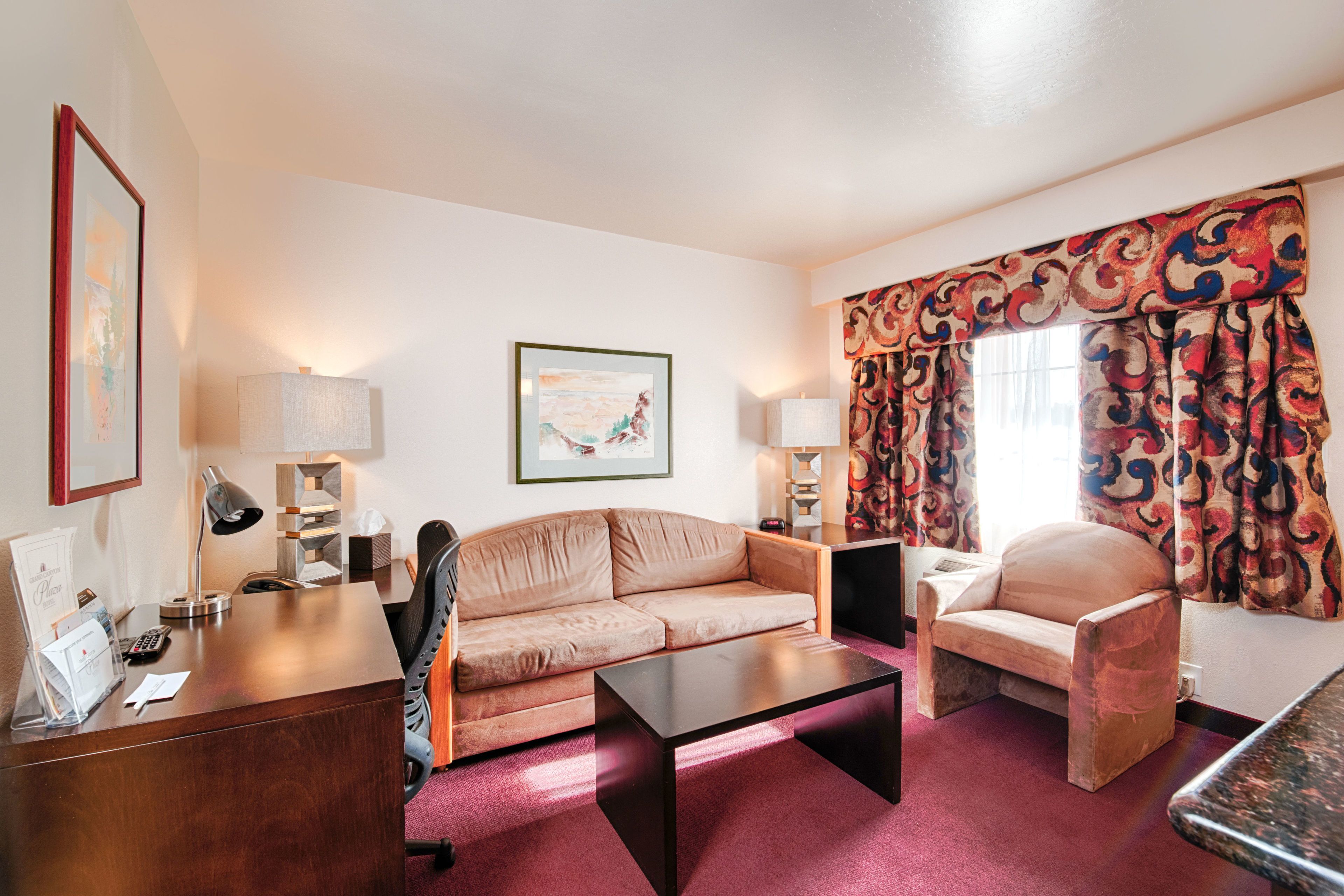 suite, 2 queen beds | living room | 24-inch led tv with satellite channels, tv