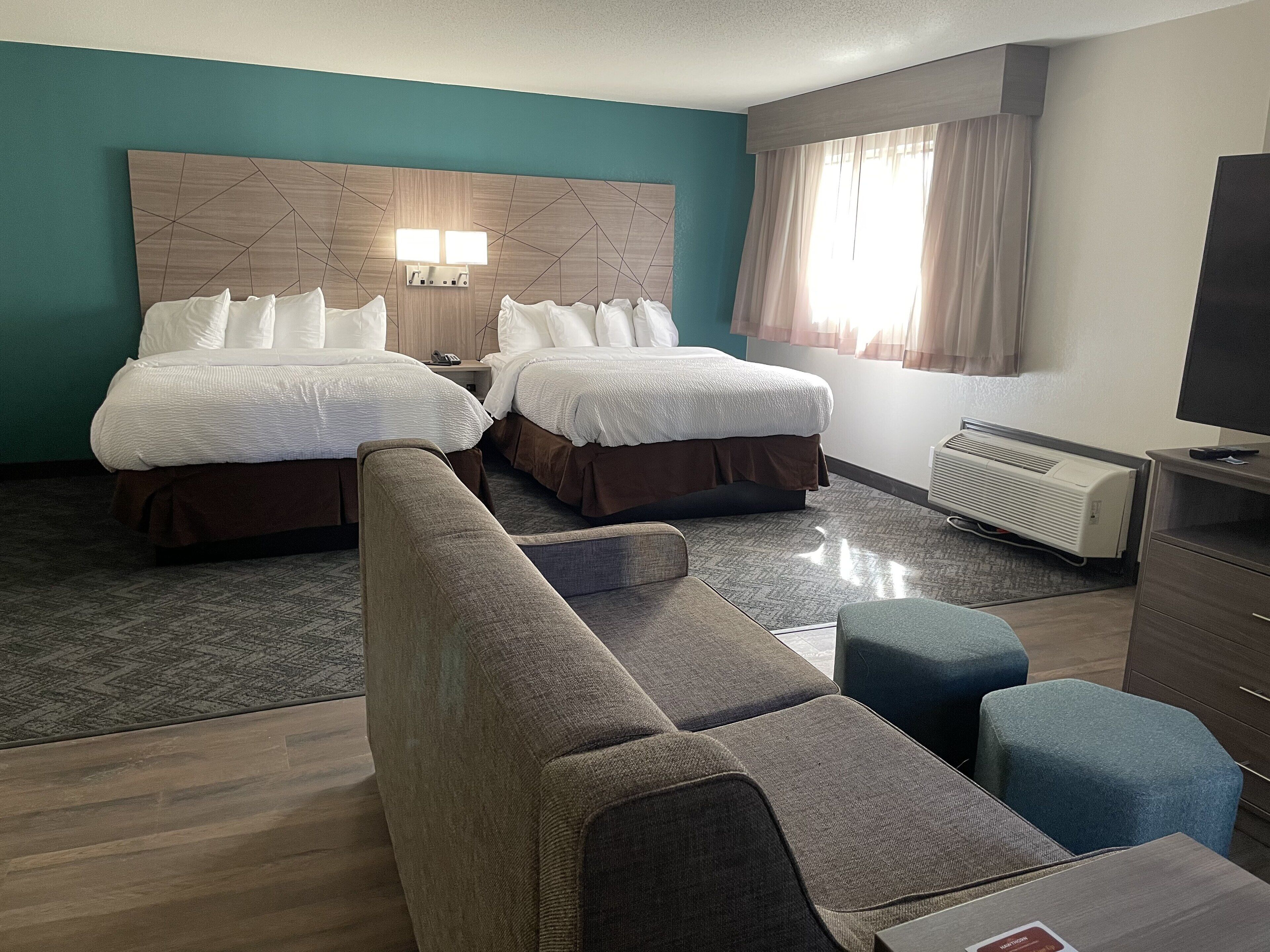 desk, laptop workspace, blackout curtains, iron/ironing board