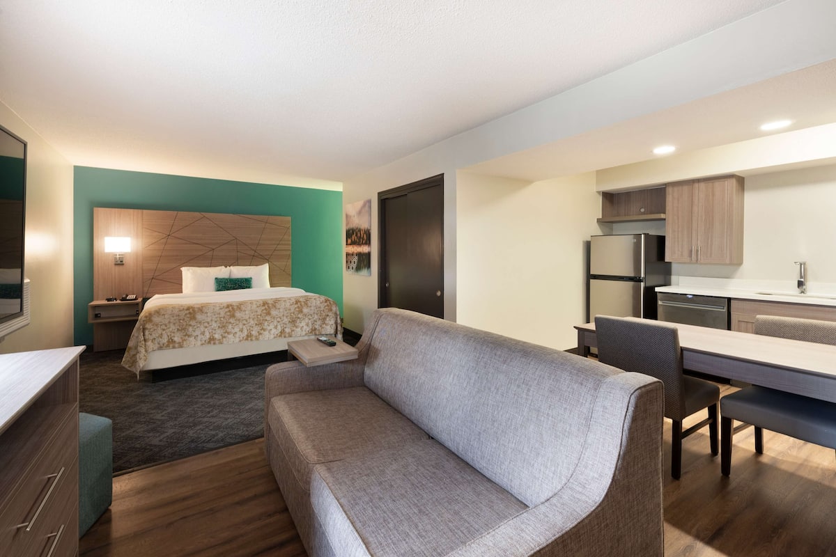 desk, laptop workspace, blackout curtains, iron/ironing board