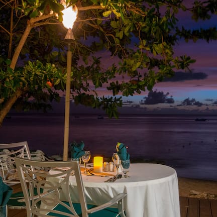 Breakfast, lunch, dinner served; beach views