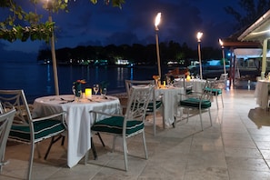 Breakfast, lunch, dinner served; beach views