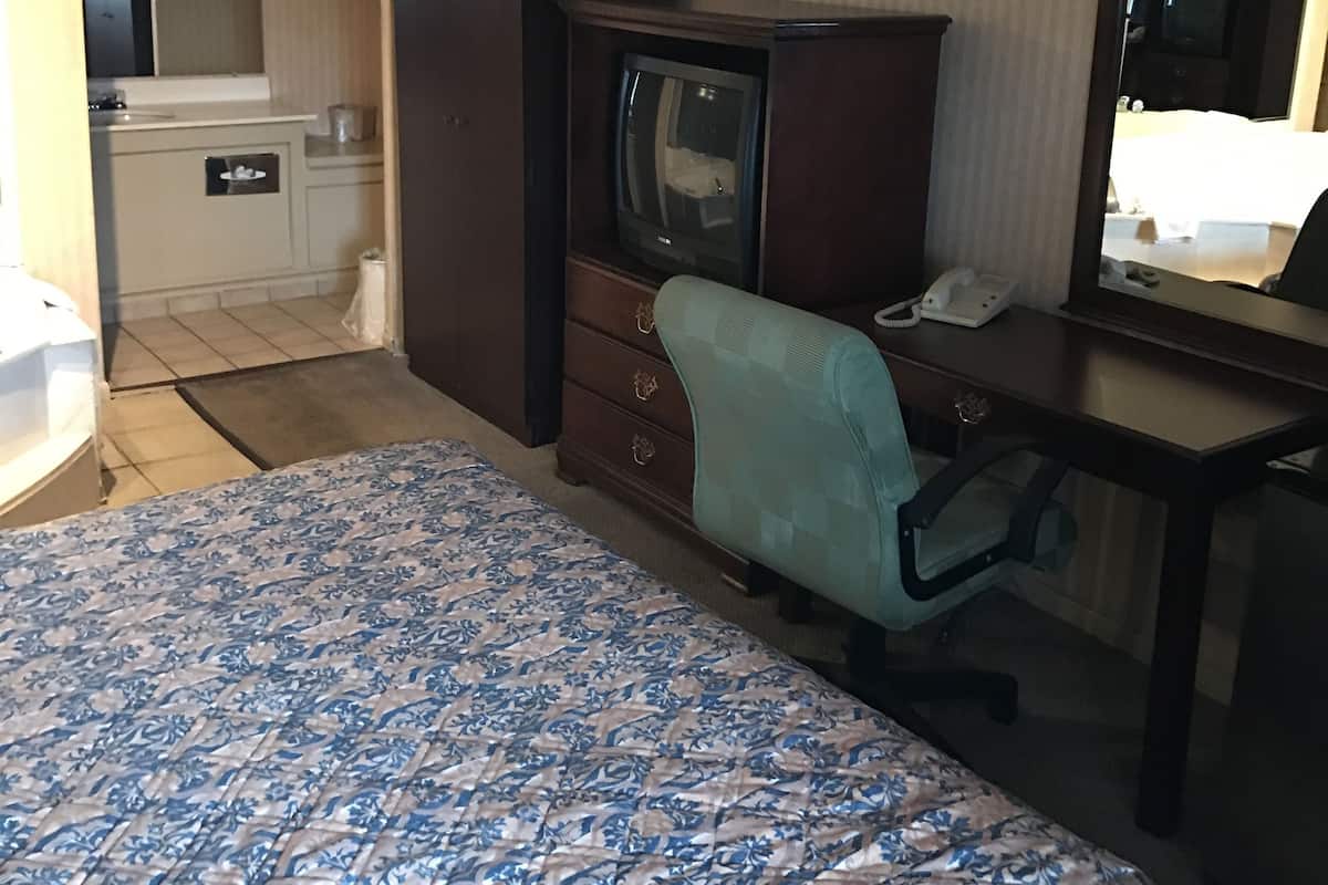 Standard Suite, 1 Bedroom, Jetted Tub | Blackout drapes, free WiFi, bed sheets
