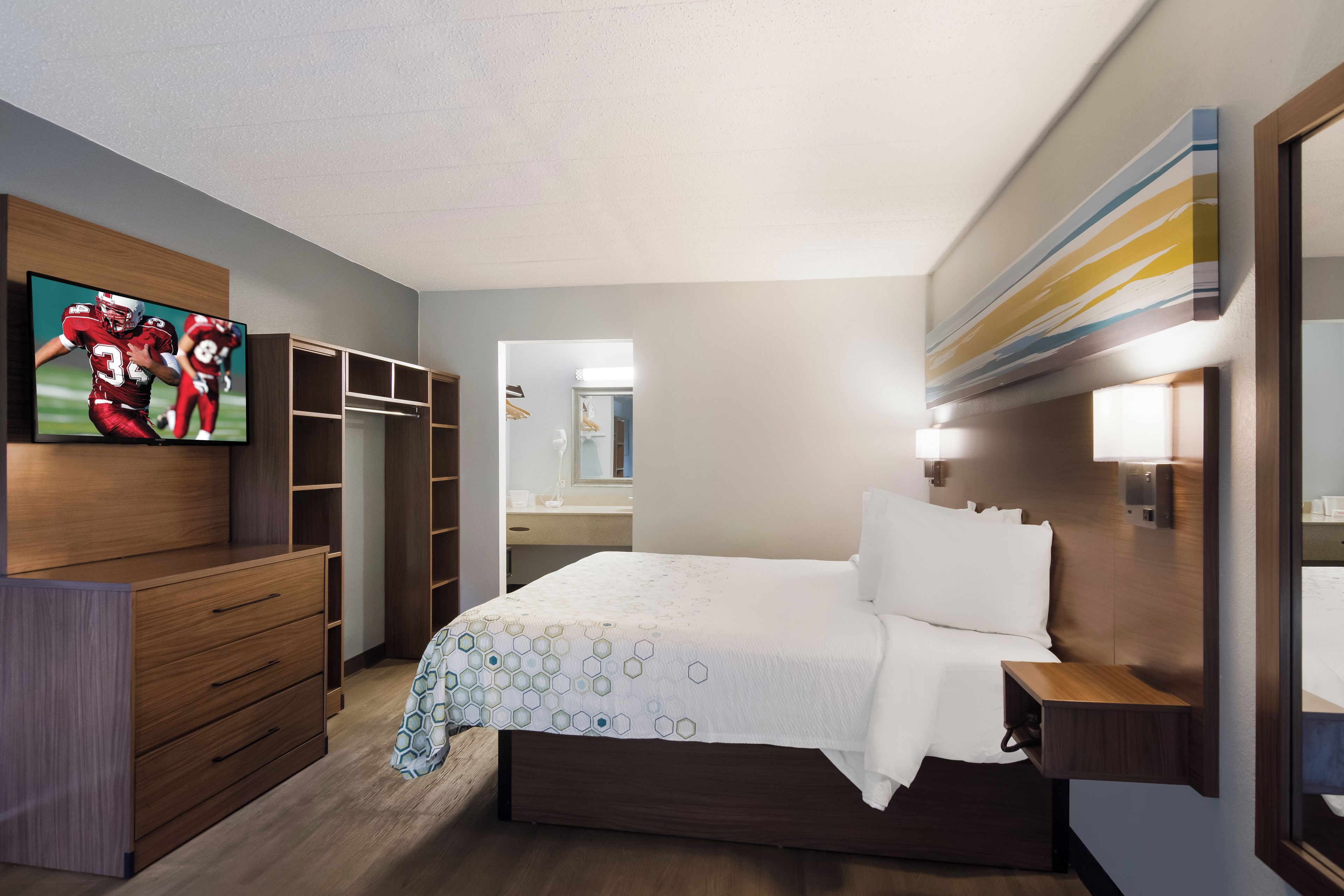 Suite, 1 King Bed, Non Smoking | 1 bedroom, desk, laptop workspace, blackout curtains