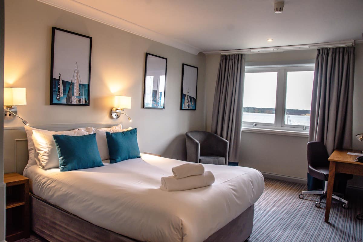 Standard Double Room, Harbour View | Desk, laptop workspace, iron/ironing board, free cots/infant beds