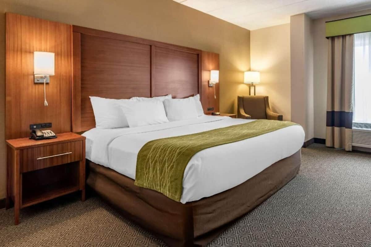 Premium bedding, memory foam beds, desk, laptop workspace