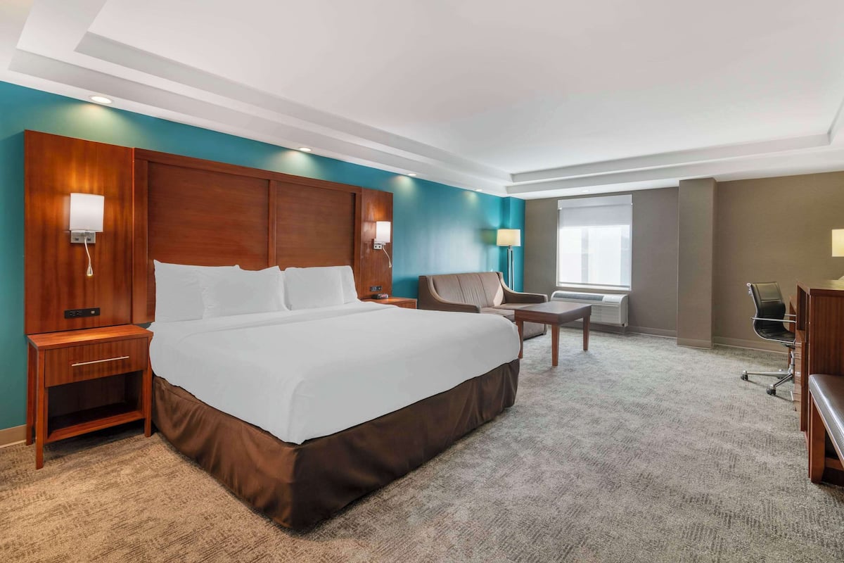 premium bedding, memory-foam beds, desk, laptop workspace