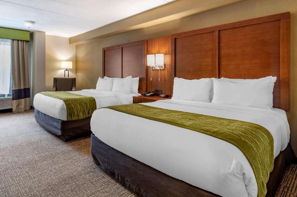 Premium bedding, memory foam beds, desk, laptop workspace