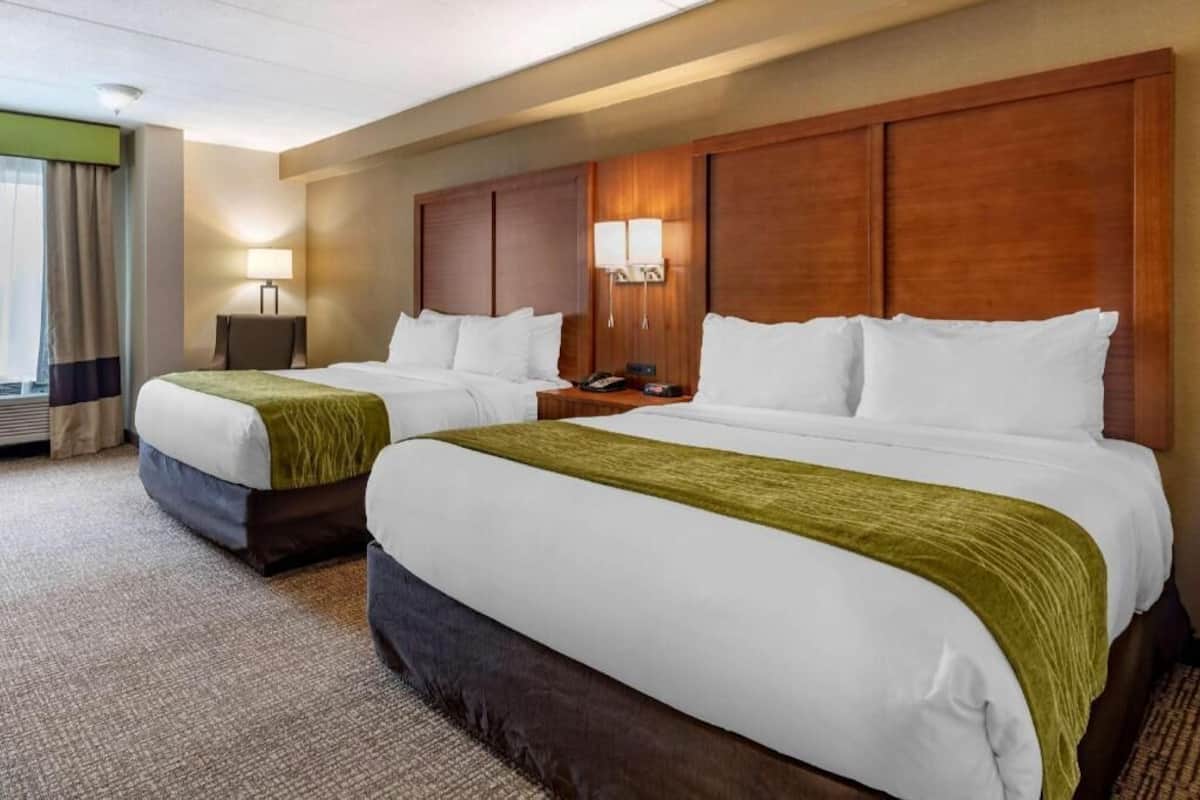 Premium bedding, memory foam beds, desk, laptop workspace