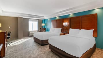 Premium bedding, memory foam beds, desk, laptop workspace