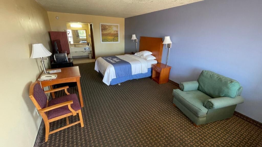 Premium bedding, desk, blackout curtains, iron/ironing board