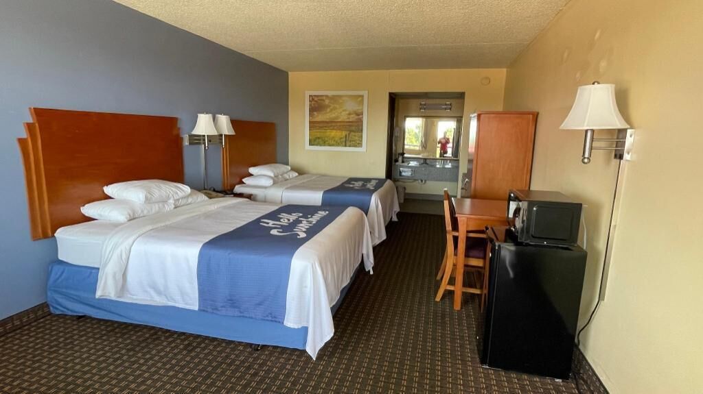 Premium bedding, desk, blackout curtains, iron/ironing board