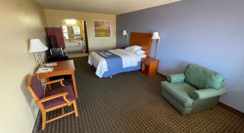 Premium bedding, desk, blackout curtains, iron/ironing board