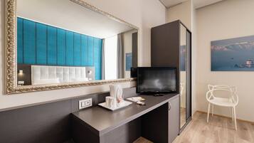 Premium bedding, down comforters, minibar, in-room safe