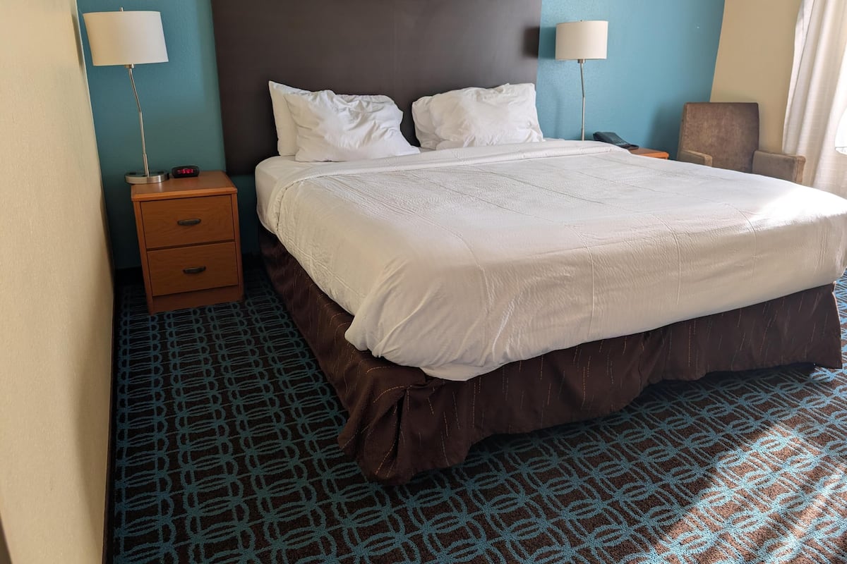 Premium bedding, desk, blackout curtains, iron/ironing board