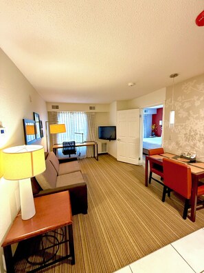 Suite, 1 Bedroom, Accessible Bathtub (Mobility,Communications) | Living area | 32-inch LCD TV with cable channels, TV