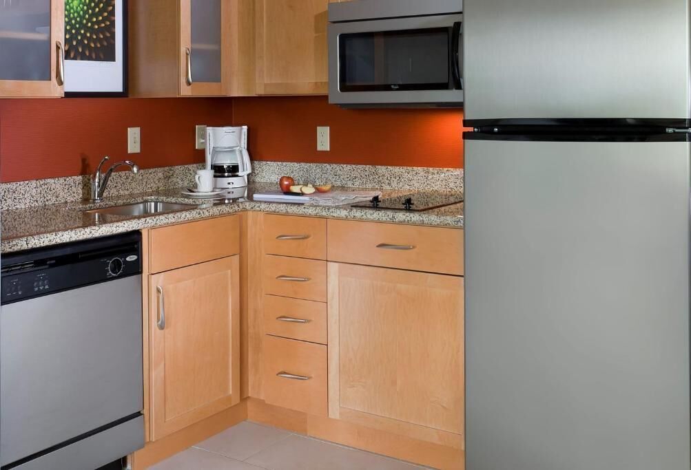 Full-sized fridge, microwave, stovetop, dishwasher