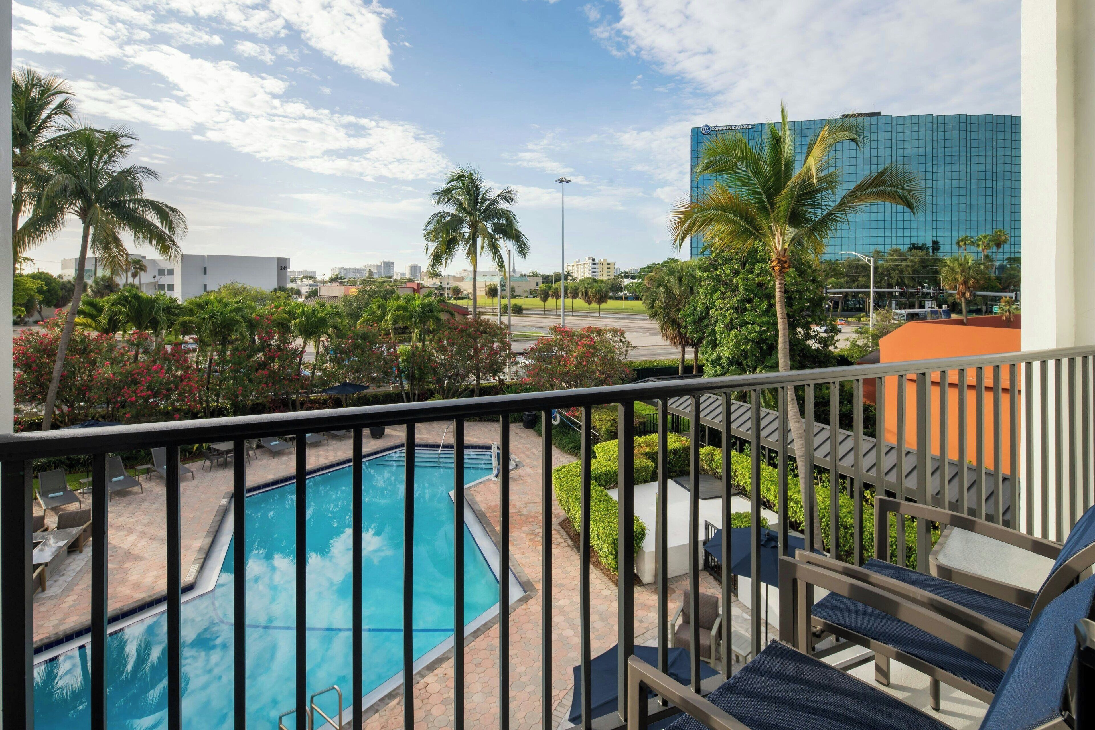 outdoor pool, open 7:00 am to 11:00 pm, pool loungers