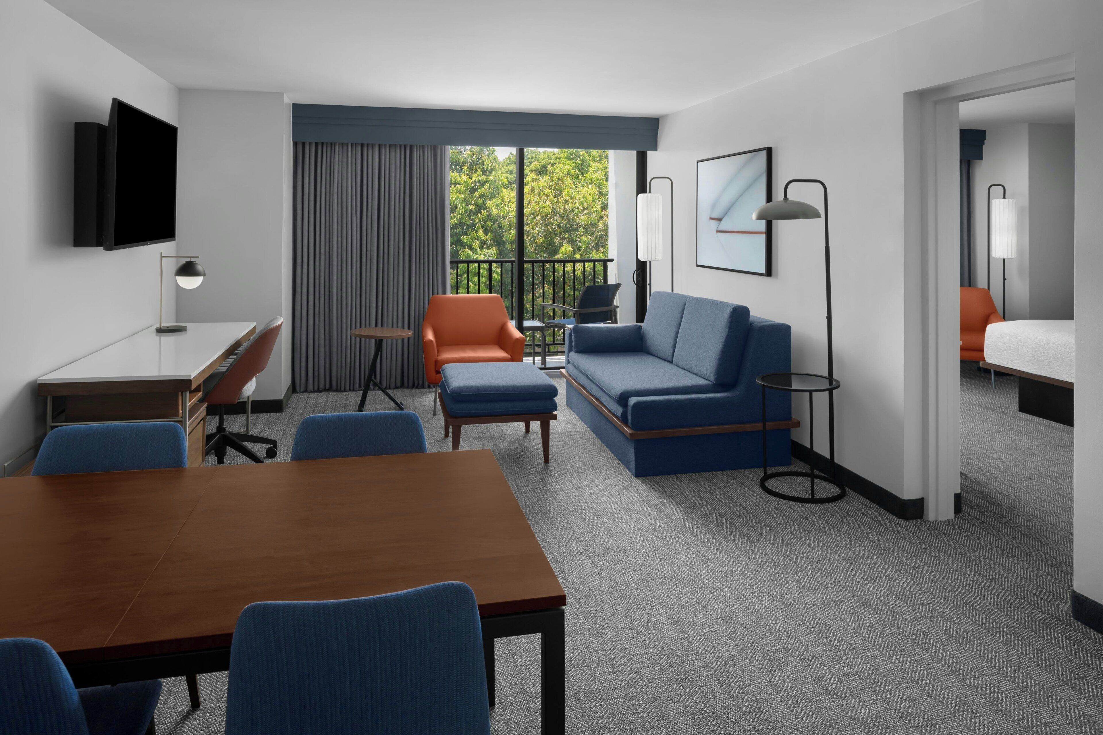 suite, 1 bedroom, non smoking, balcony | living room | 55-inch flat-screen tv with cable channels, tv, netflix