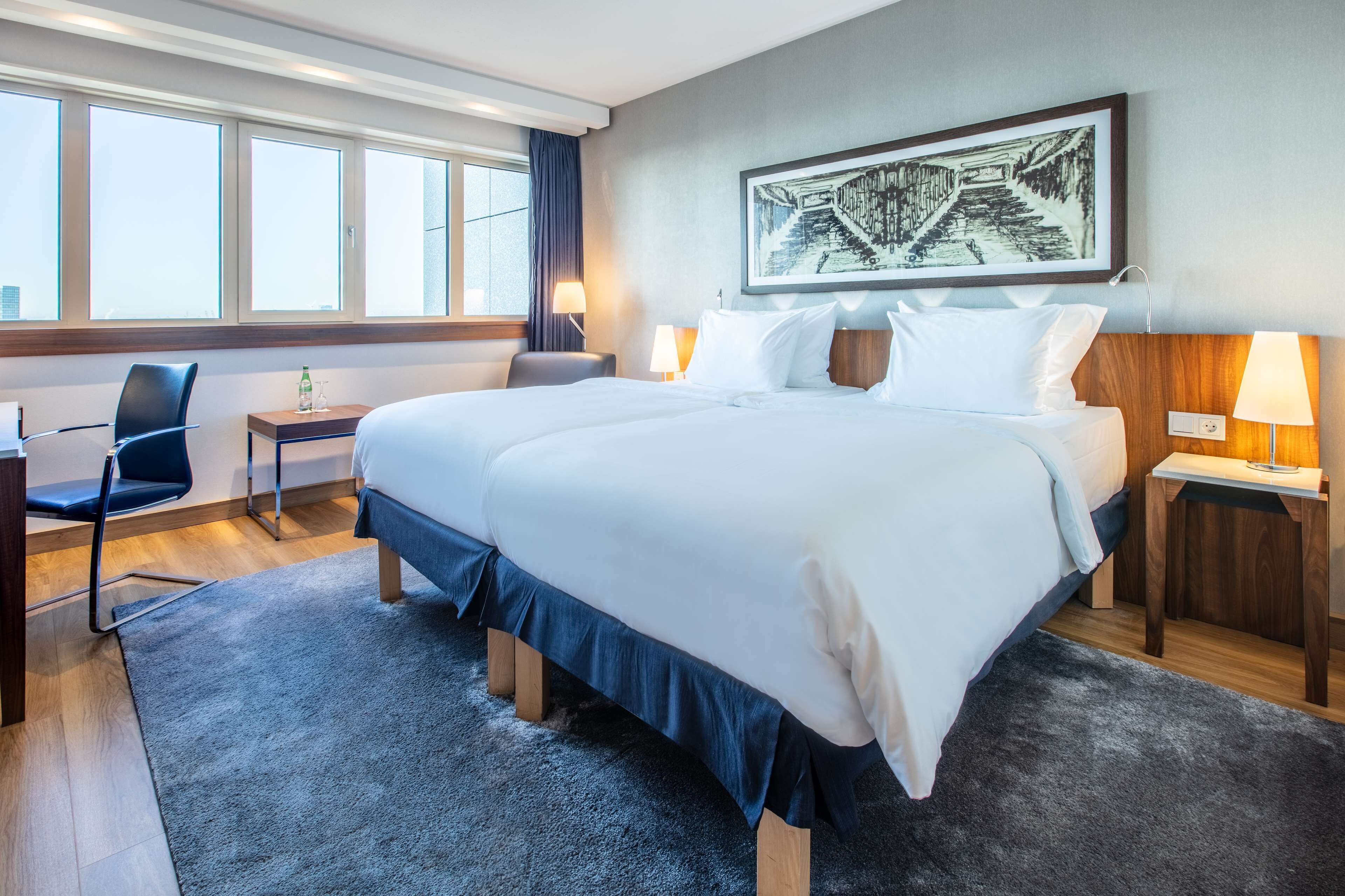 Hypo-allergenic bedding, in-room safe, desk, laptop workspace