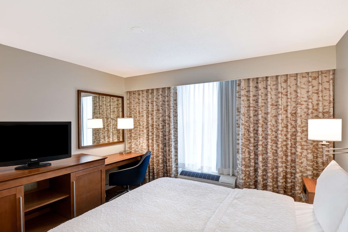 Desk, laptop workspace, blackout curtains, soundproofing