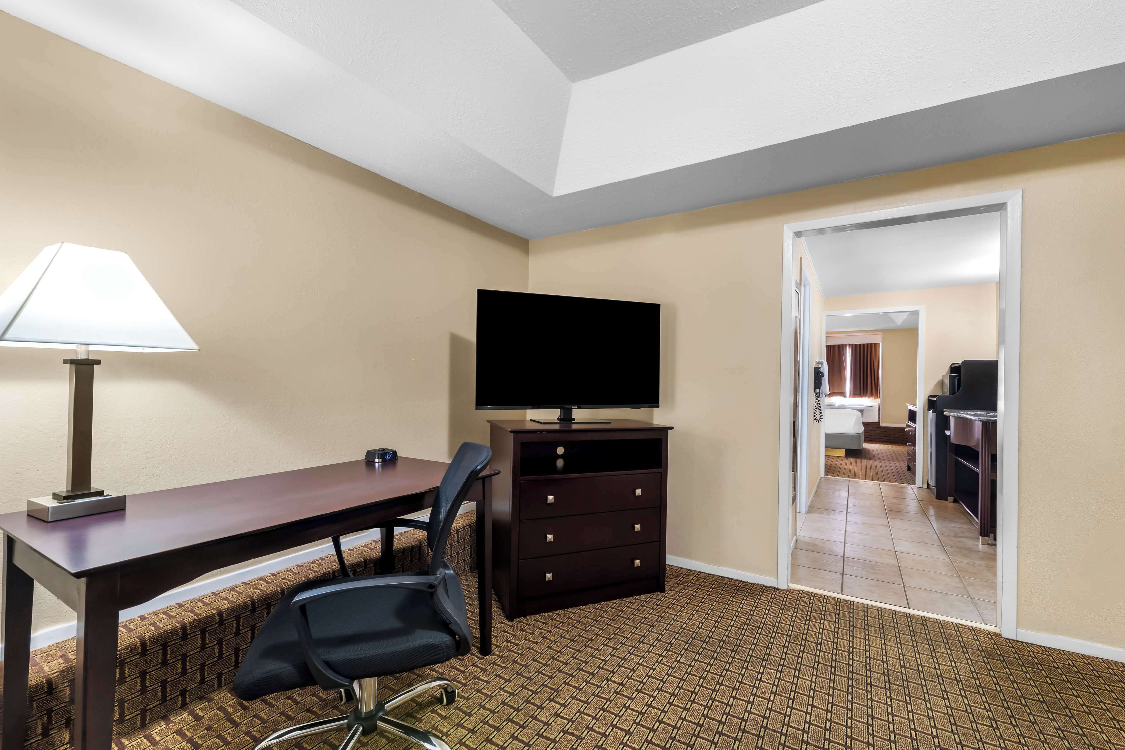 suite, 1 king bed, non smoking (living room;walk-in shower) | desk, laptop workspace, iron/ironing board, free cots/infant beds