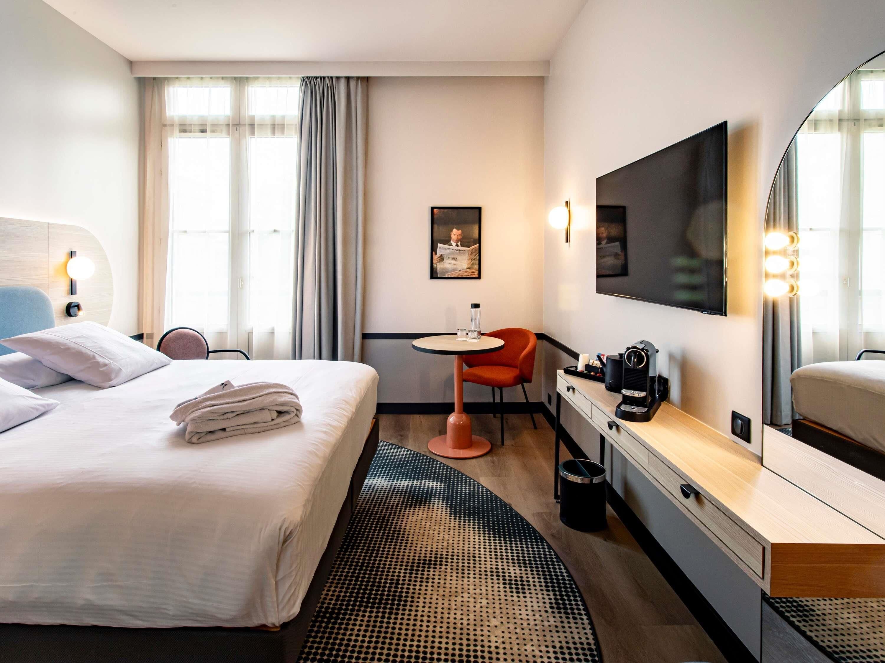 Biancheria da letto di alta qualità, una cassaforte in camera