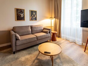 Chambre Deluxe, 1 très grand lit et 1 canapé-lit