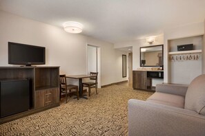 Suite, 1 King Bed, Non Smoking, Ground Floor (One-Bedroom) | In-room safe, desk, iron/ironing board, free cribs/infant beds