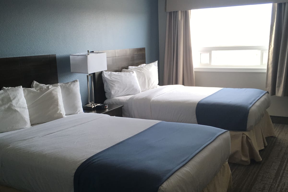 room, 2 double beds, non smoking, ground floor | in-room safe, desk, iron/ironing board, free cots/infant beds