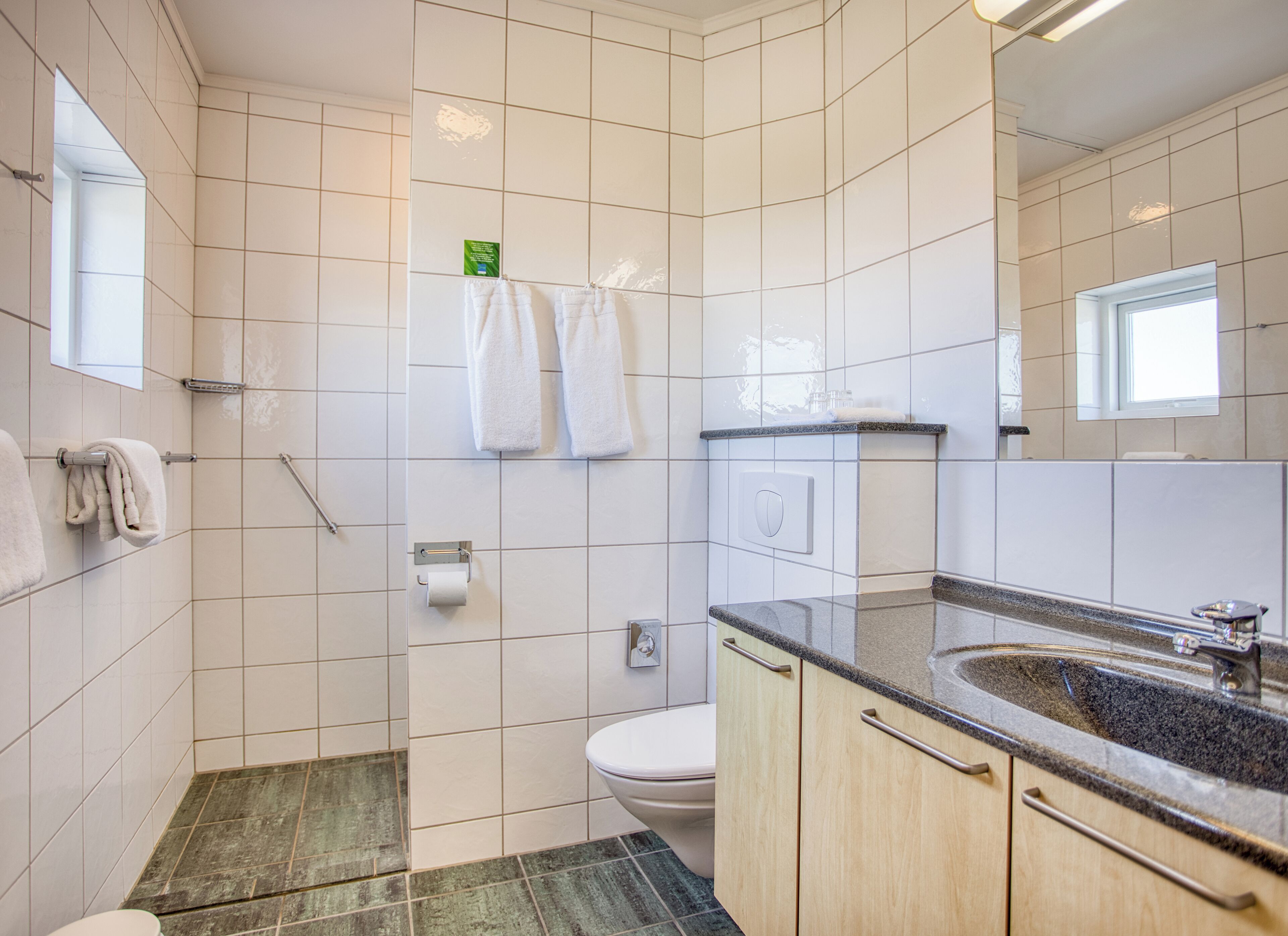 superior apartment | bathroom | hair dryer, towels, soap, shampoo