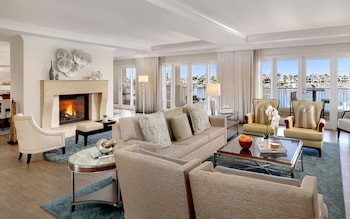 Presidential Suite | Living area | 42-inch LCD TV with cable channels, TV, iPod dock at Balboa Bay Resort