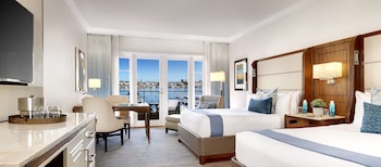 Premium bedding, down comforters, pillowtop beds, in-room safe at Balboa Bay Resort