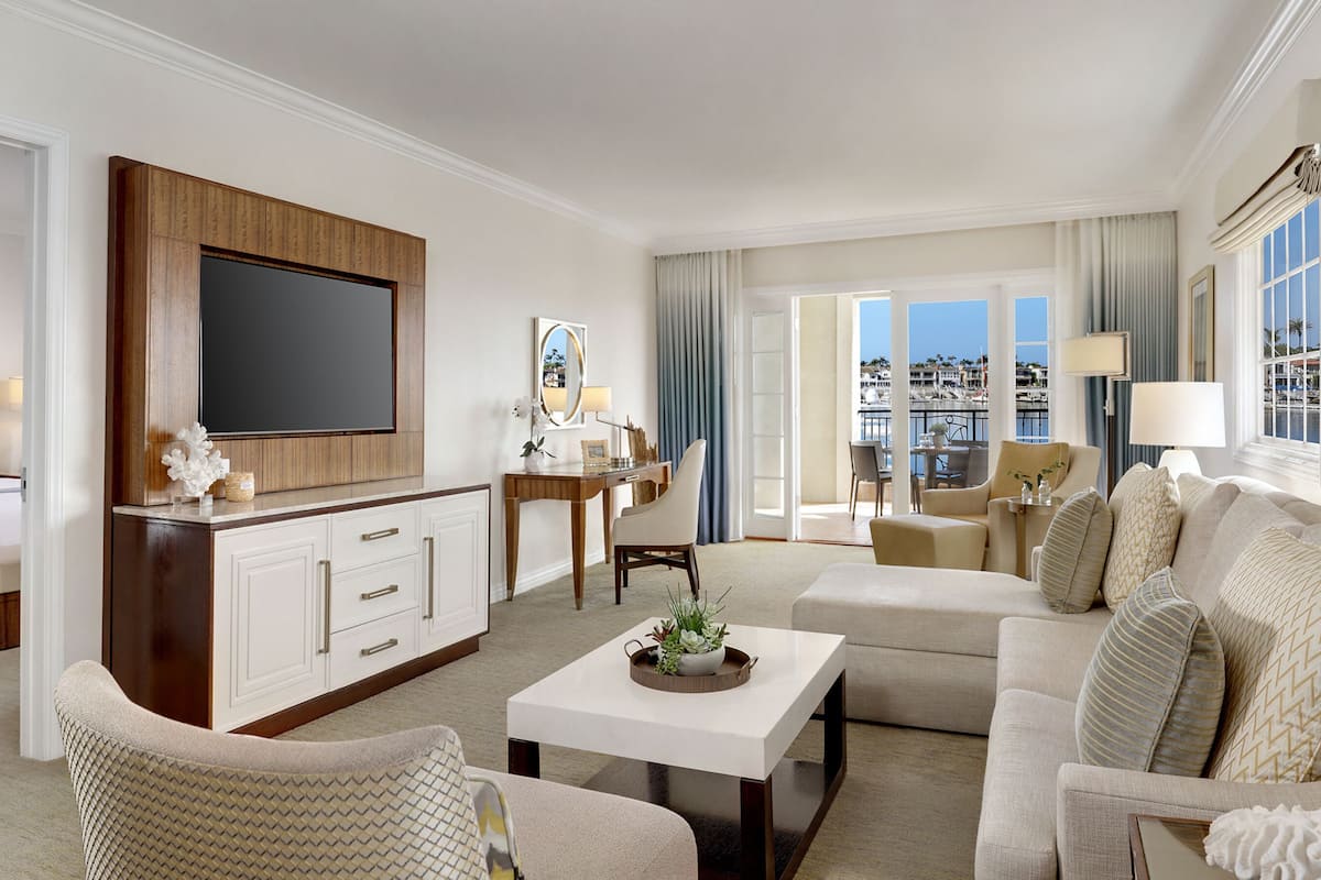 Suite, 1 King Bed, Bay View | Living area | 42-inch LCD TV with cable channels, TV, iPod dock