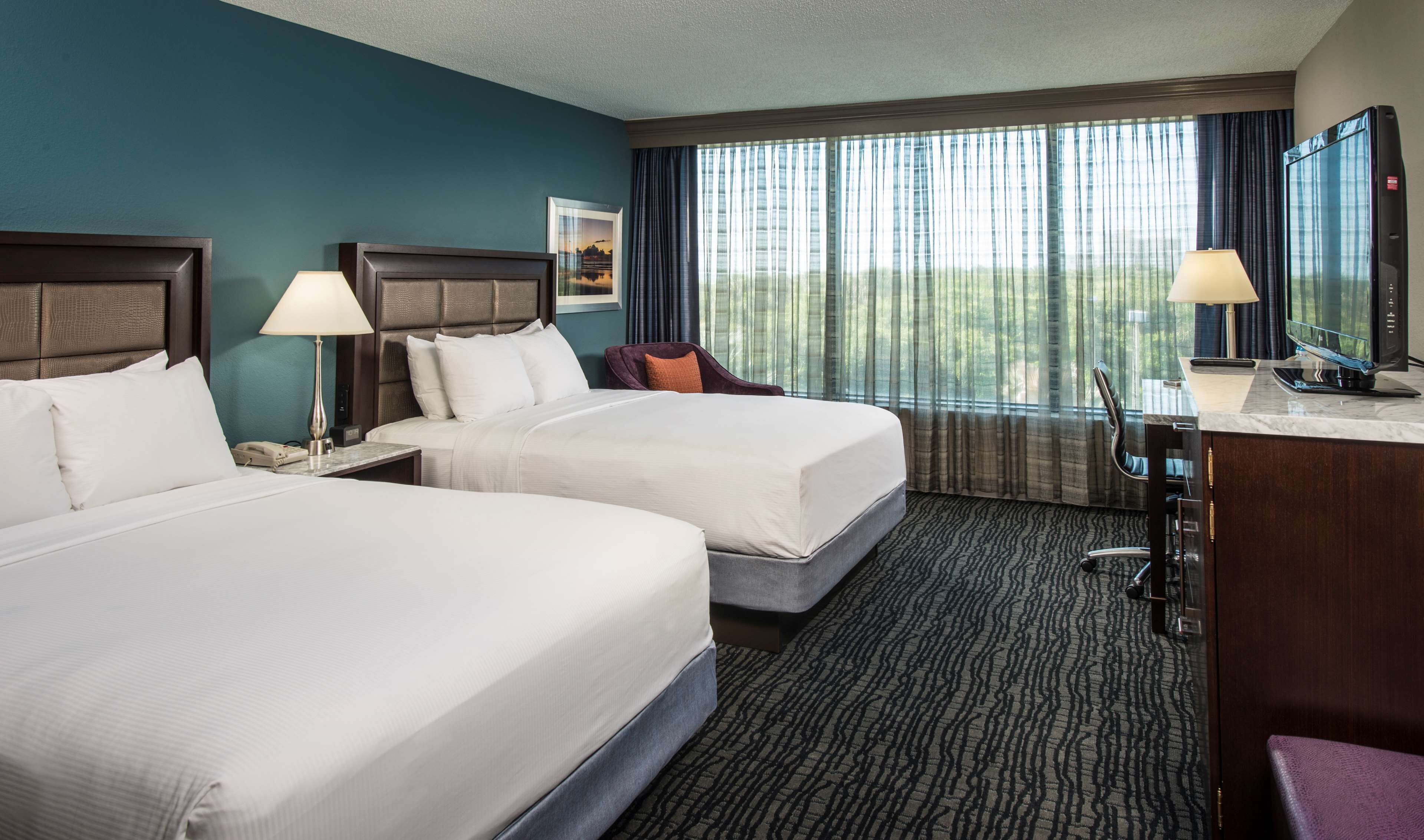 Premium bedding, down comforters, pillowtop beds, in-room safe