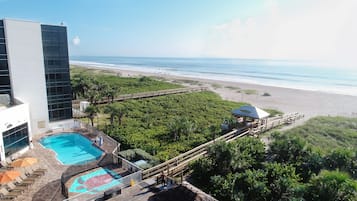 On the beach, sun-loungers, beach umbrellas, beach towels