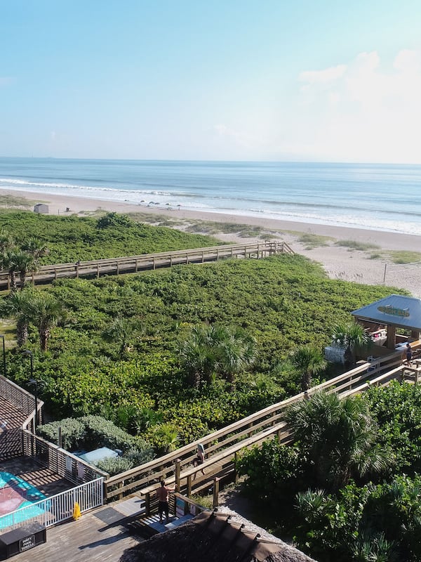 On the beach, sun loungers, beach umbrellas, beach towels